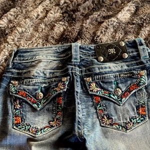 Miss Me Signature Boot Jeans with Flower Embroidery on back pockets. Size 26